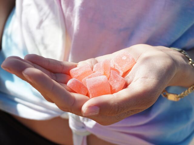 hand full of cbd gummies